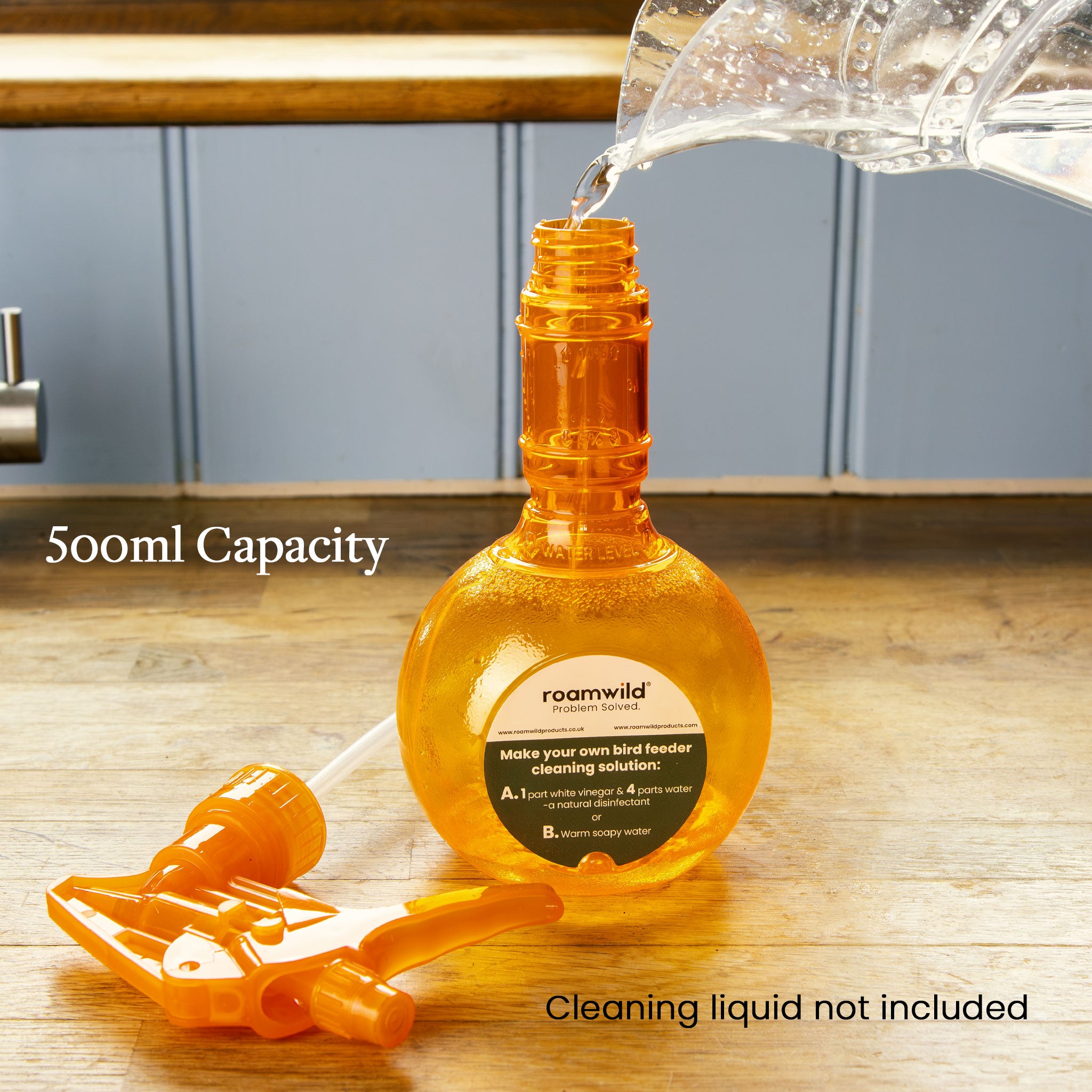 Filling the refillable Roamwild 500ml spray bottle with cleaning solution